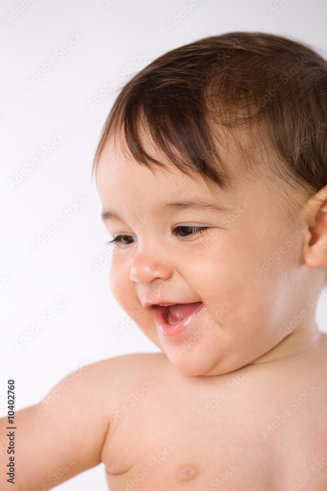 Smiling happy 8 months old baby girl, white background. Smiling happy 8 months old baby girl, white background.