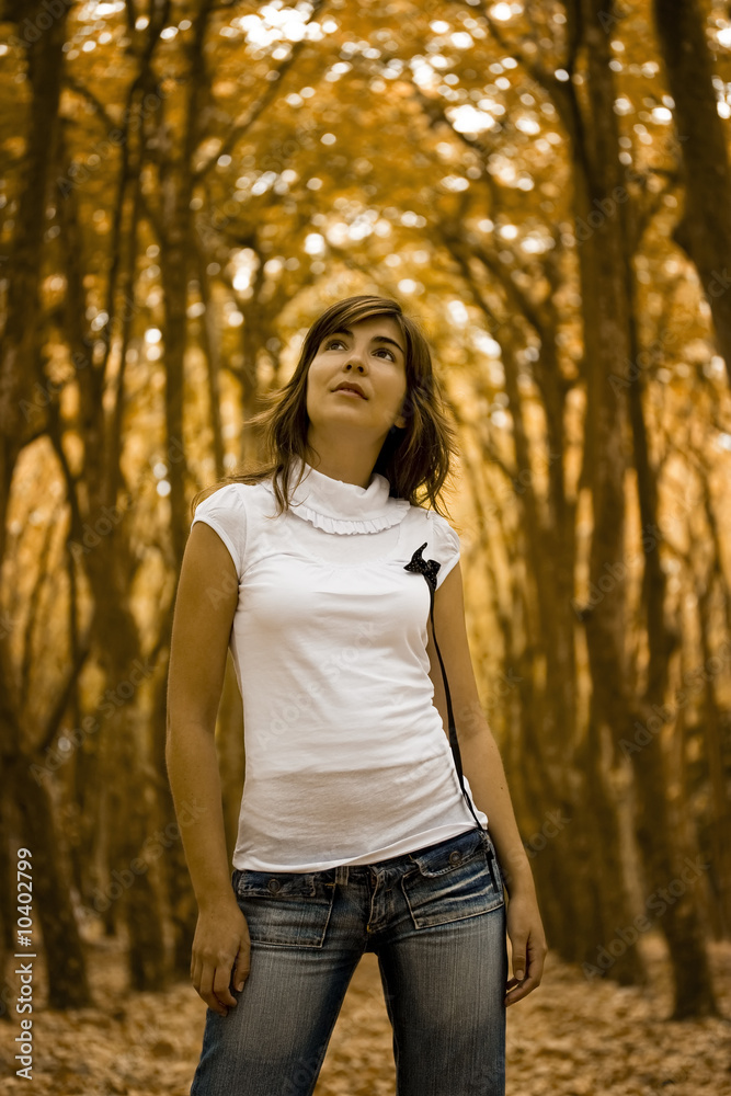 Beautiful happy woman in the Autumn Park Beautiful happy woman in the Autumn Park