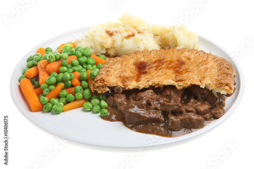 Steak pie with mashed potato, peas, carrots and gravy