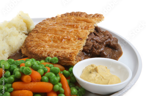 Steak pie with mash, vegetables and English mustard