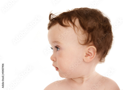 pretty serene little girl profile on white background