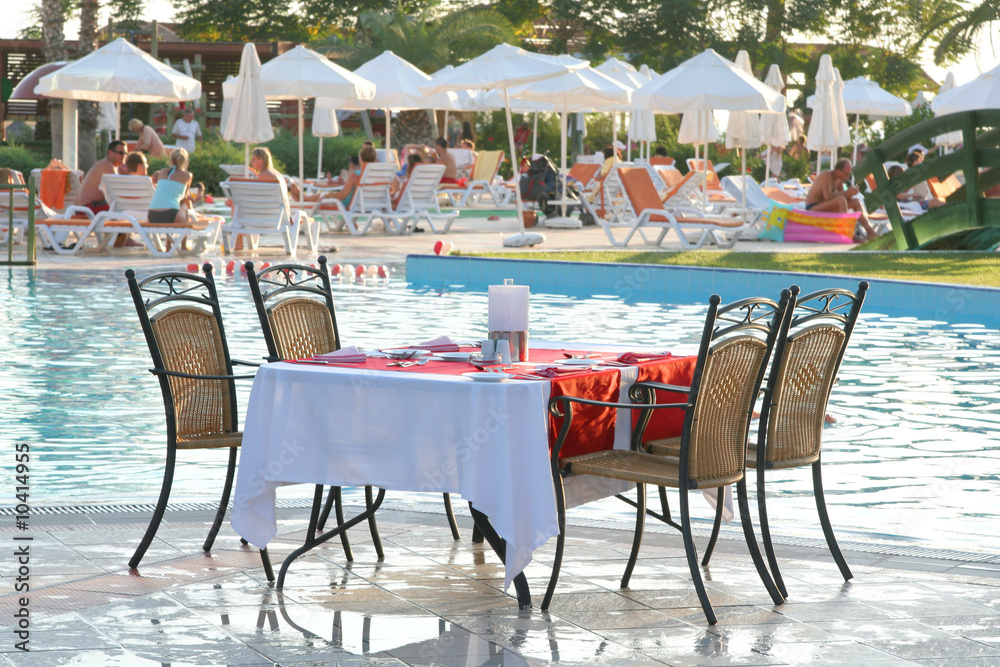 Restaurant table near the pool