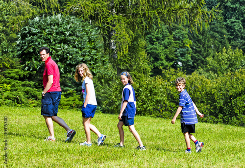 outdoor portrait of family on  a walk