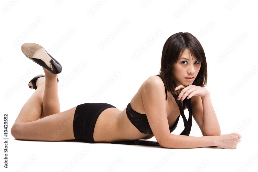 A beautiful sexy asian girl in lingerie lying down on the floor Stock Photo  | Adobe Stock