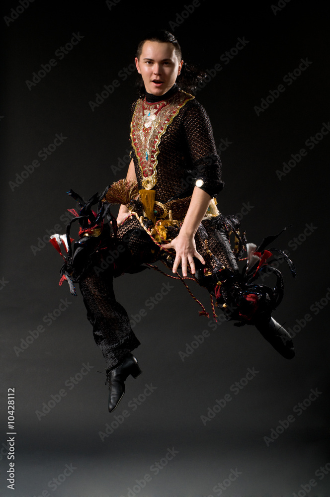 Naklejka premium a young nice man dancing modern dances