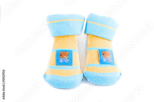 little baby socks with teddy bears on a white background