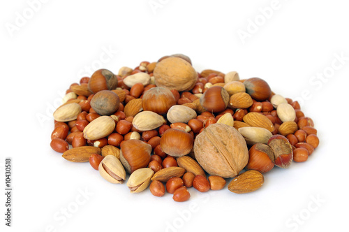 Heap of nuts isolated on white background