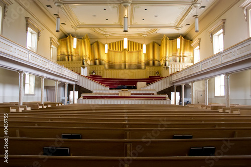 fancy church assembly hall with old pipe organ photo