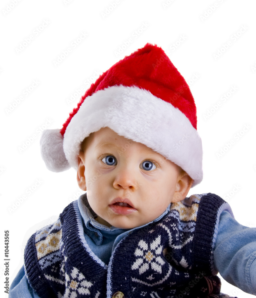 Handsome baby boy wearing a santa hat portrait Handsome baby boy wearing a santa hat portrait