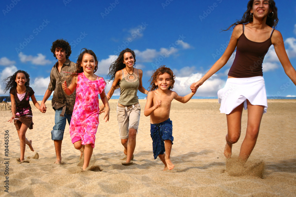 Funny Happy Children Running on the Beach