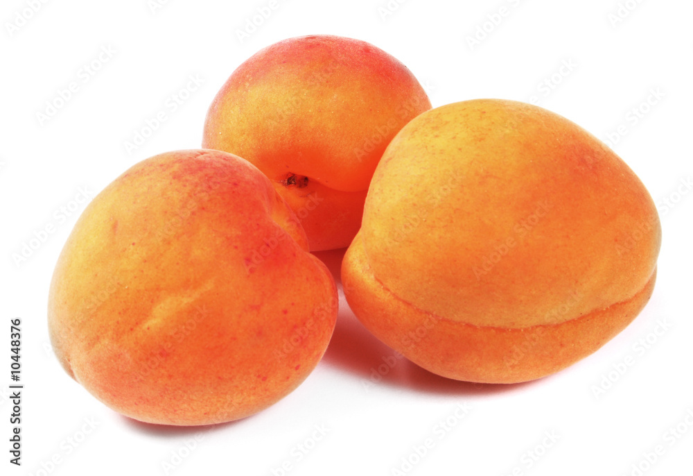 Three fresh peaches isolated on white background Three fresh peaches isolated on white background