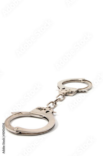 police handcuffs isolated on a white background