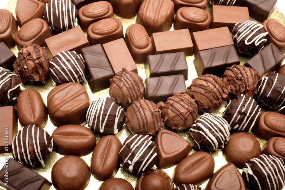 Fototapeta premium close up shot of chocolates on white background