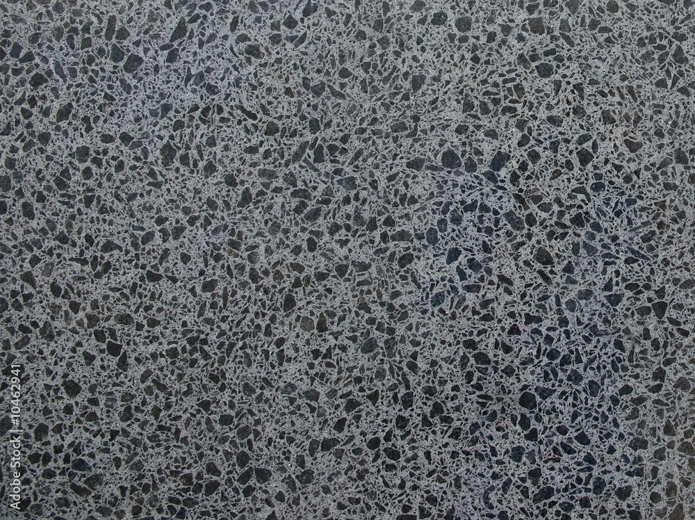A texture photo of grey and black granite