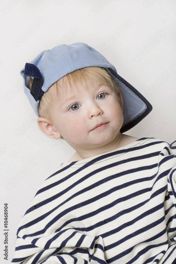 portrait of adorable one year baby with cap portrait of adorable one year baby with cap