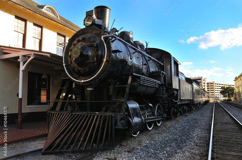 Old steam train at station