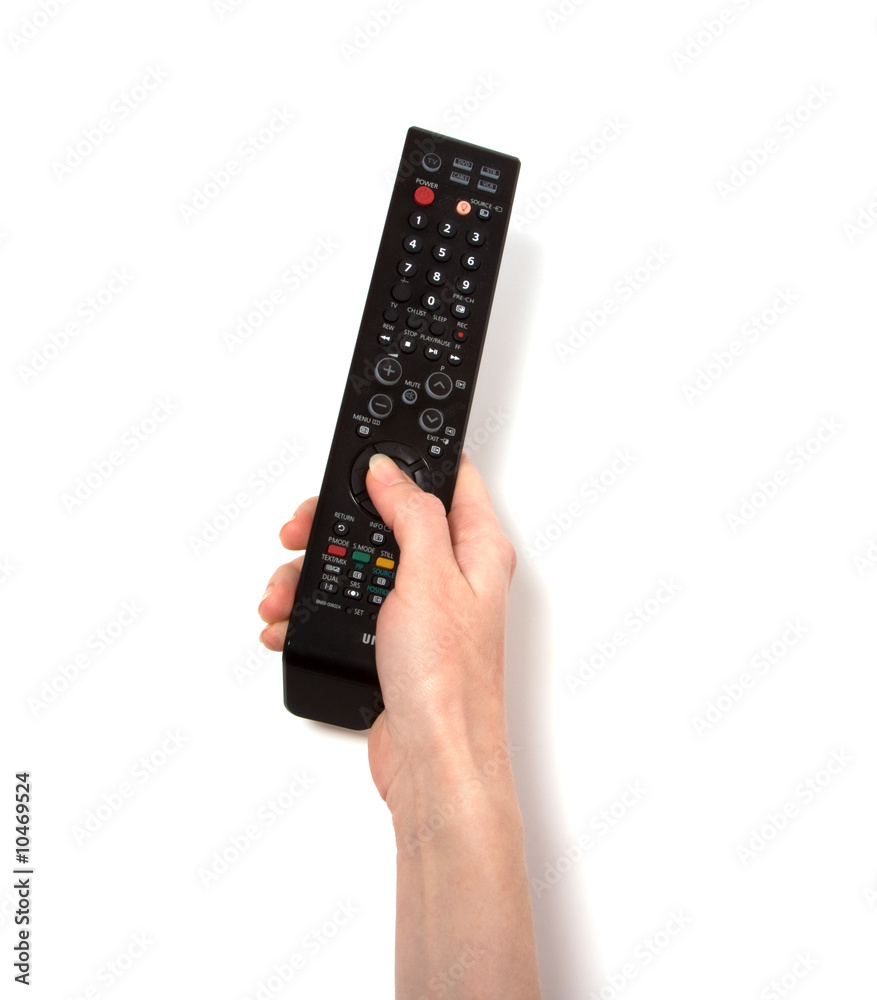 Hand holding tv remote control isolated on white background Hand holding tv remote control isolated on white background