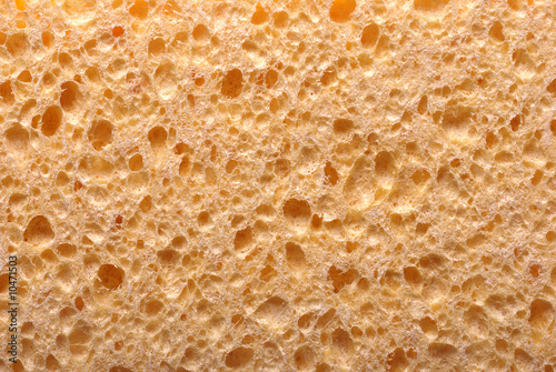 Close up of a yellow cleaning sponge