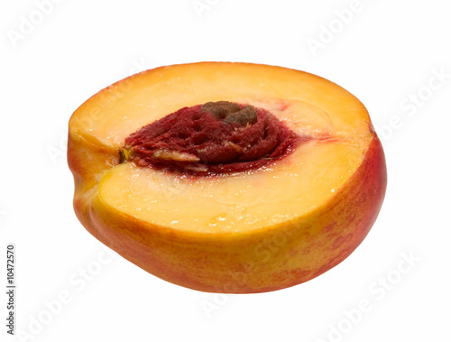 sliced peach on white background