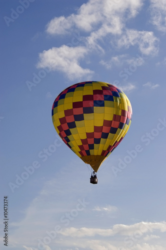 A vertical image of a hot air balloon
