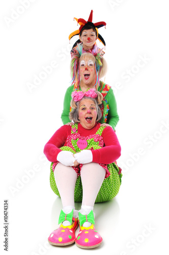 Portrait of clowns posing in vertical composition