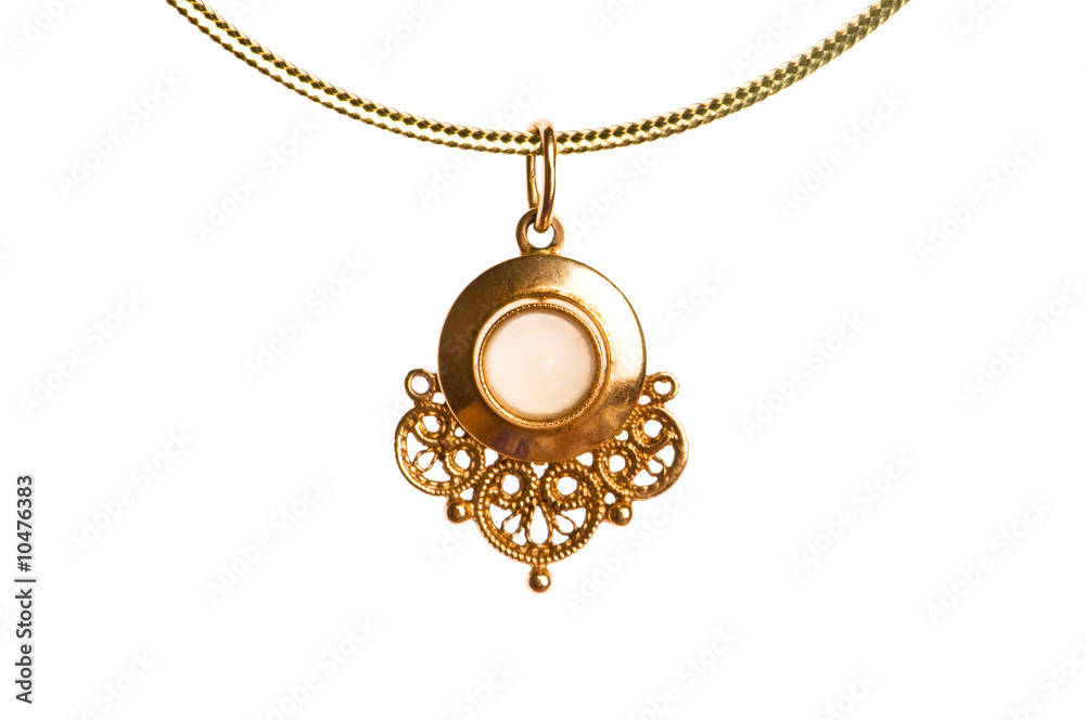 Pendant on golden chain isolated on the white Pendant on golden chain isolated on the white