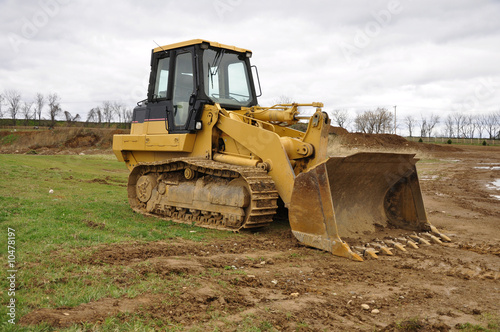 yellow bulldozer at a construction site