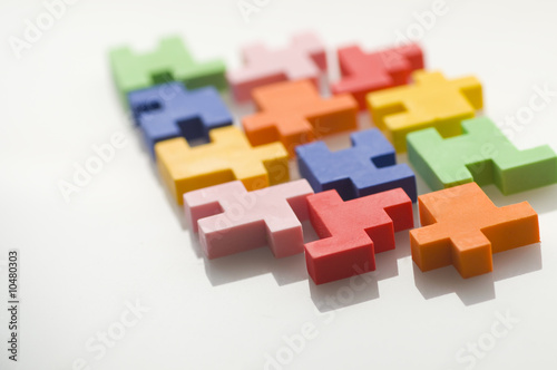 Colorful rubber blocks on white background.