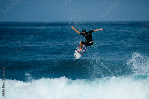 surfer doing big ariel