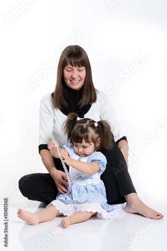 Father and little daughter playing