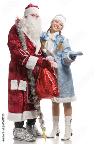 Santa Claus and Snow Maiden with the stretched palm