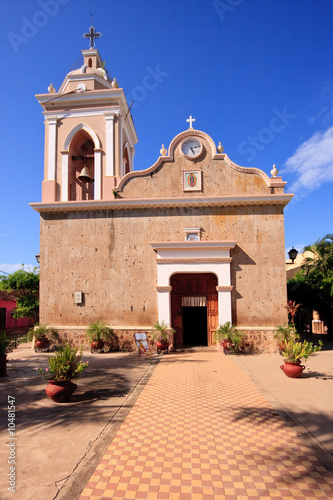 View down tiled path to door of El Quelite Church in Mexico