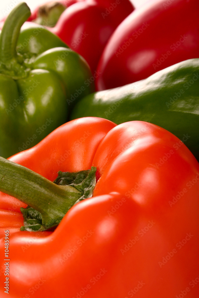 Fresh peppers in different colors close up Fresh peppers in different colors close up