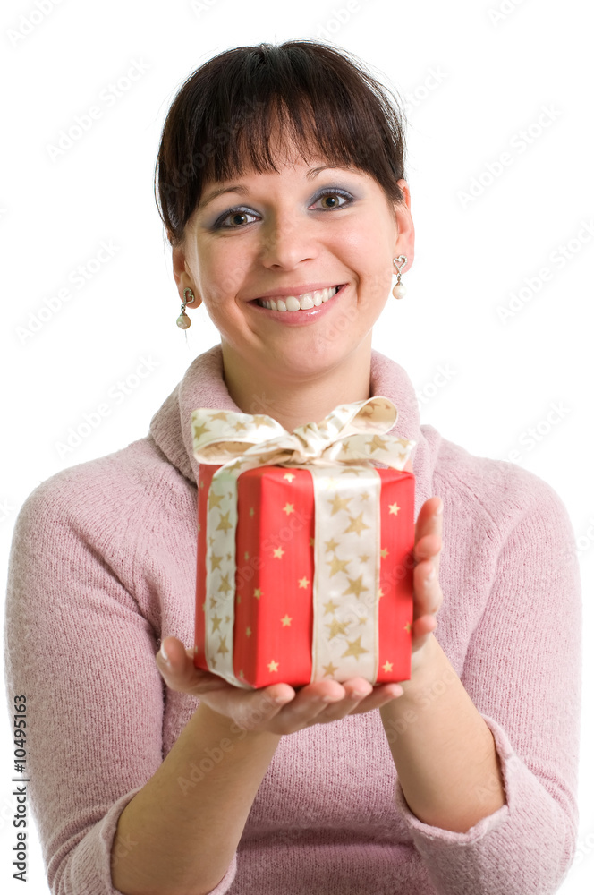 young brunette holding red Christmas present isolated over white young brunette holding red Christmas present isolated over white