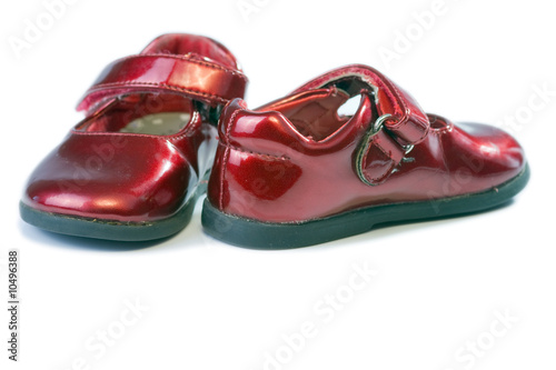 red child shoe on white background