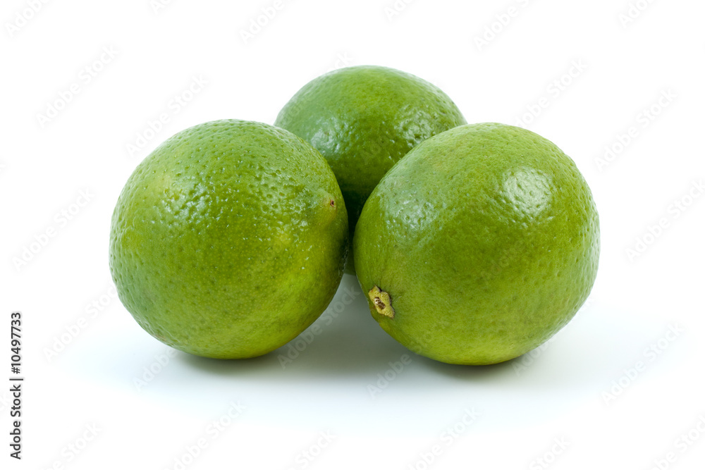 Three limes isolated on the white background Three limes isolated on the white background