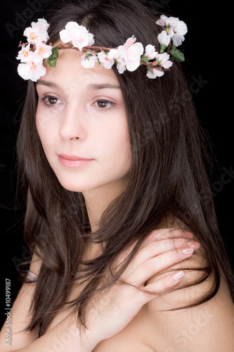 beautiful young woman portrait, dark background