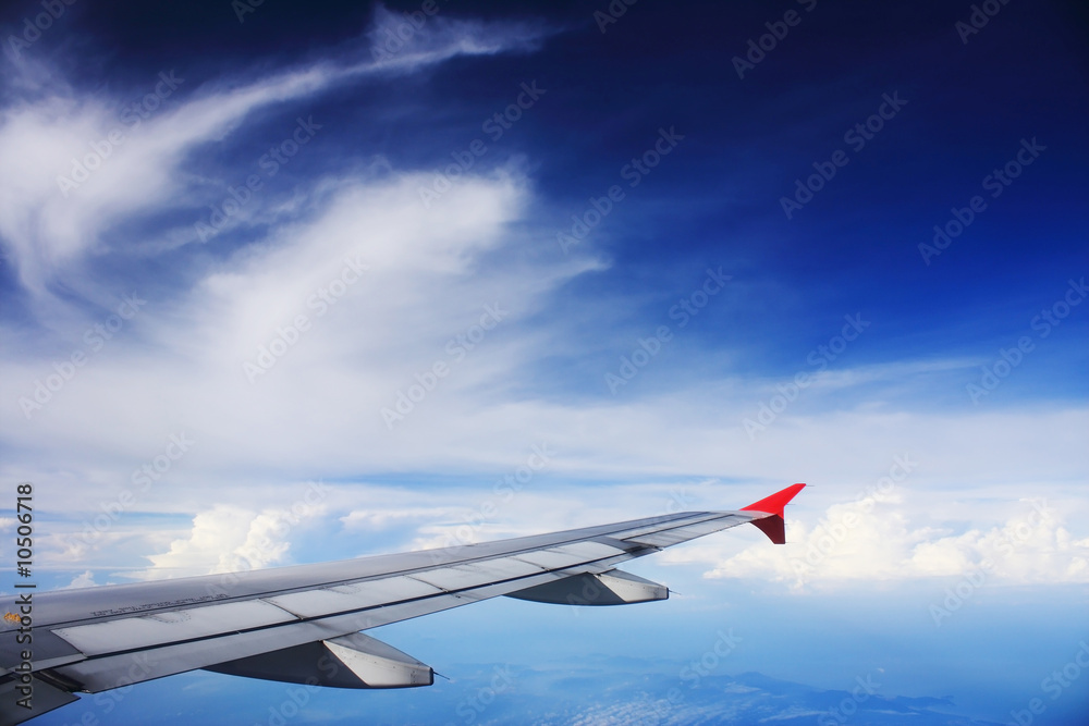 Fototapeta premium Aerial view of cloudy blue sky on sunny day.