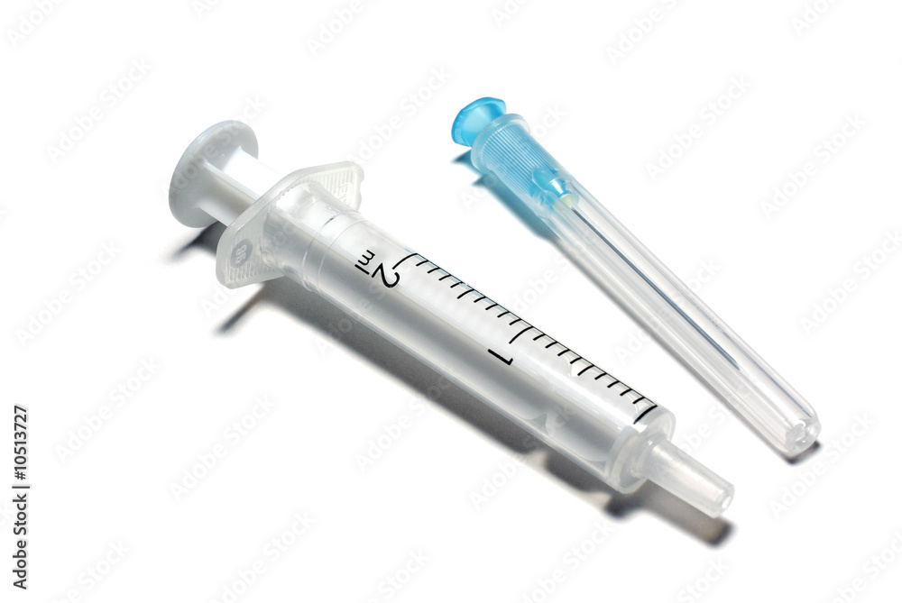 New syringe isolated on white background. New syringe isolated on white background.