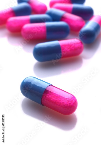 Pink and blue capsules