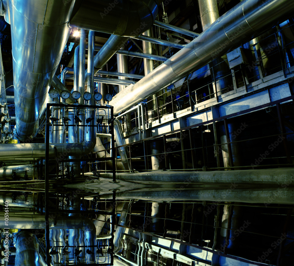 Pipes, tubes, machinery and steam turbine at a power plant