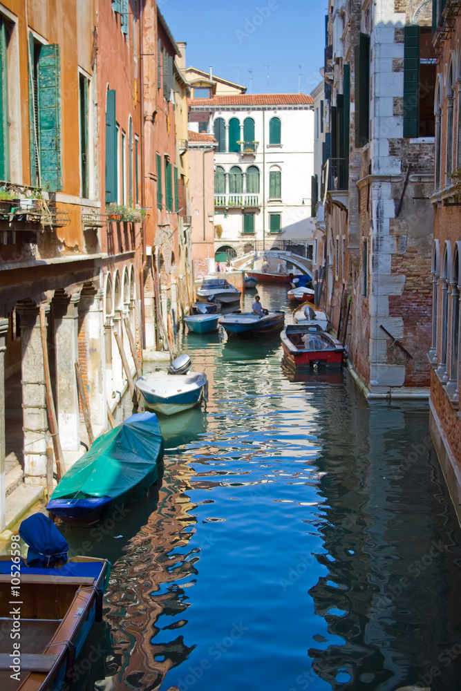 A typical canal in Venice and a bridge