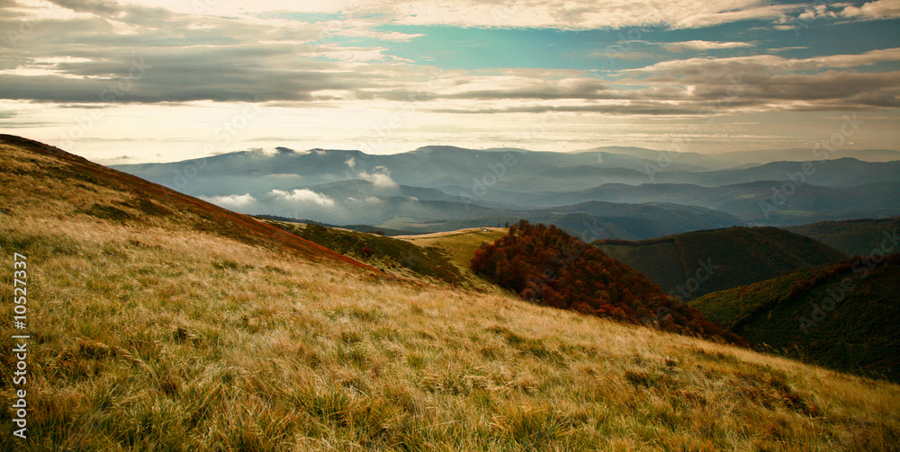 Mountains theme: an image of autumn landscape Mountains theme: an image of autumn landscape