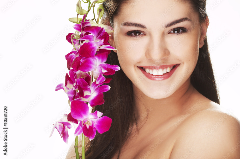 happy young woman with orchid on white background happy young woman with orchid on white background