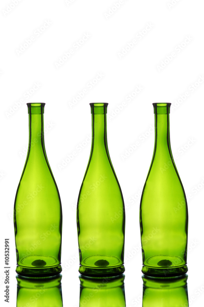 Three green wine bottles isolated on white Three green wine bottles isolated on white