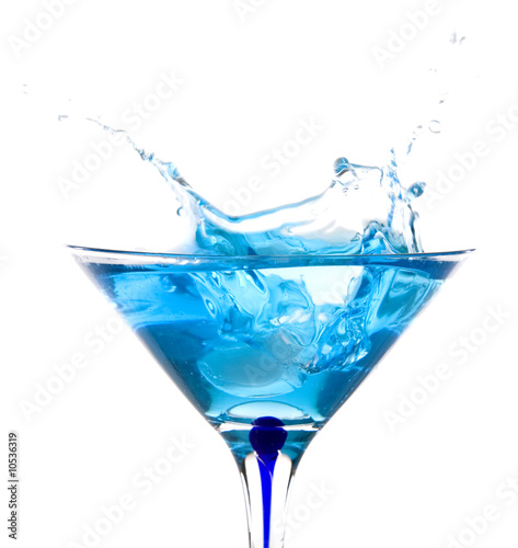 beautiful glass filled with blue water on white