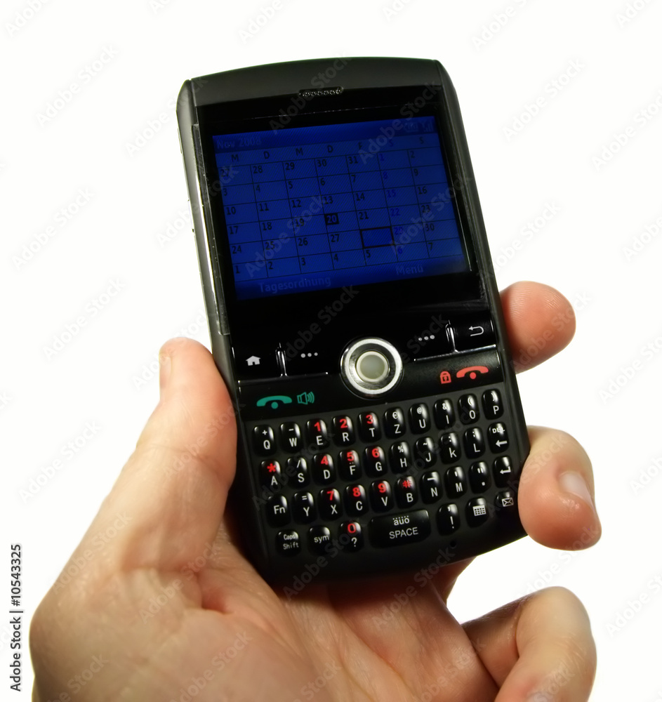 male hand holding pda/black berry/mobile phone male hand holding pda/black berry/mobile phone