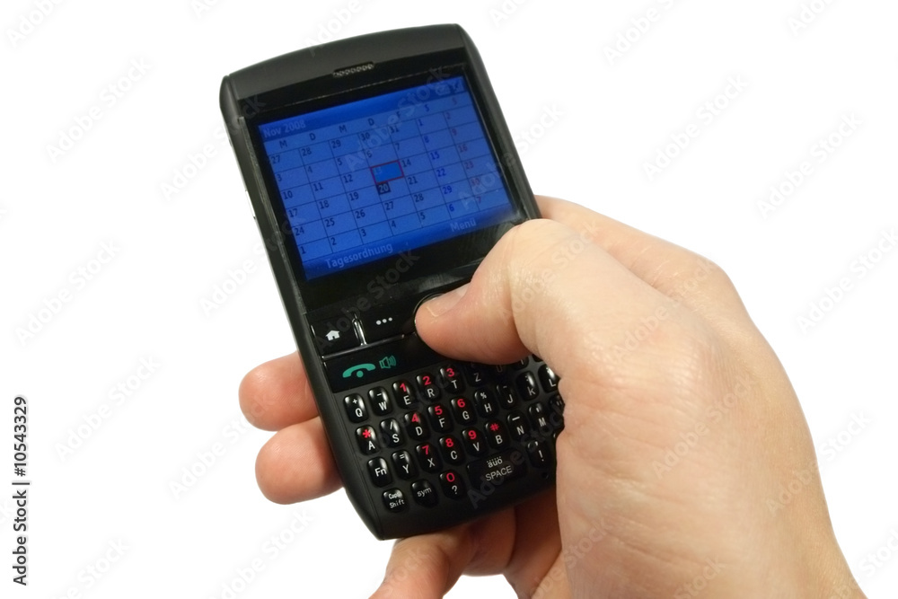 male hand holding pda/black berry/mobile phone male hand holding pda/black berry/mobile phone