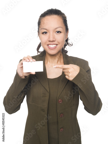 businesswoman pointing to her new blank business card. photo