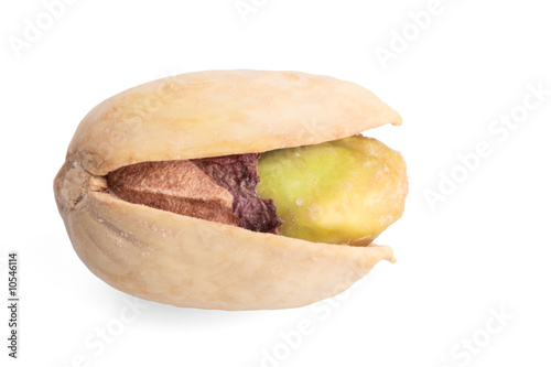 Single pistachio nut isolated background